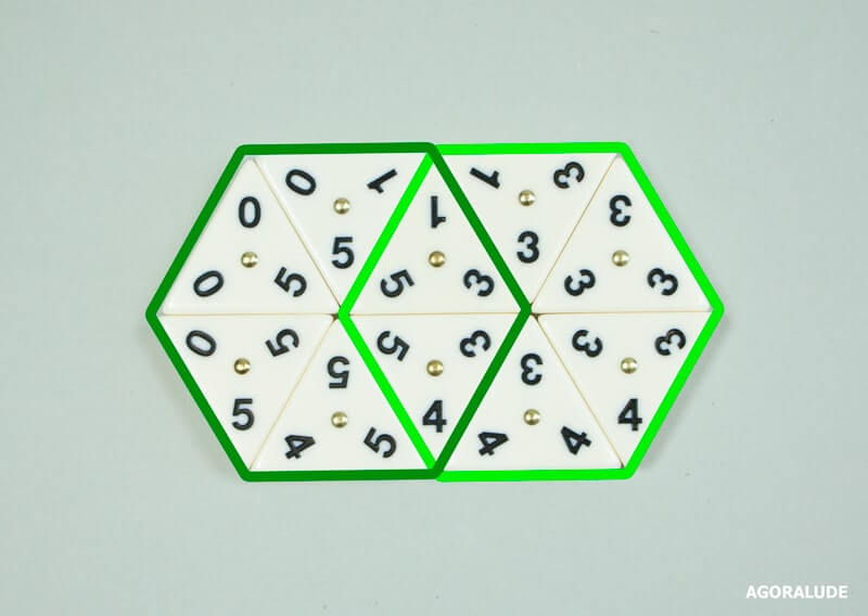 Un double hexagone réaliser au Triominos donne un bonus de 40 points